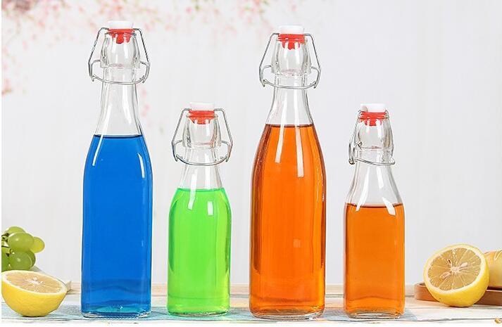 High Quality Beverage Soft Drink Beer Glass Bottles with Tap