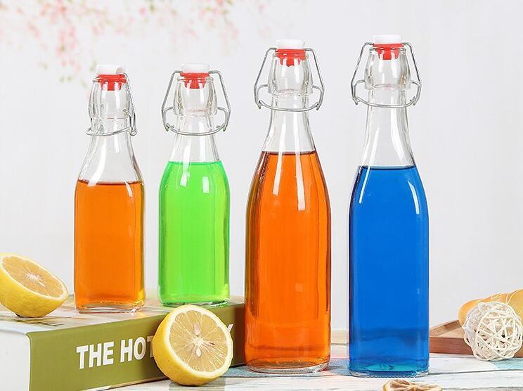 High Quality Beverage Soft Drink Beer Glass Bottles with Tap