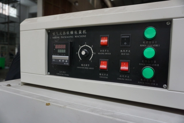 Semi Automatic Film Wrap Shrinking Machine Packing Machinery