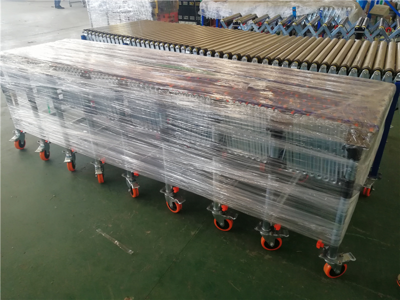 Adjustable Roller Conveyor Ribbed Belt Drive Power Roller Conveyor