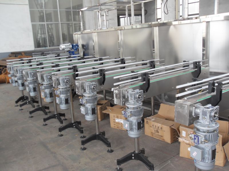 Conveyor System for Delivering Products Including Bottles, Boxes, Bags etc