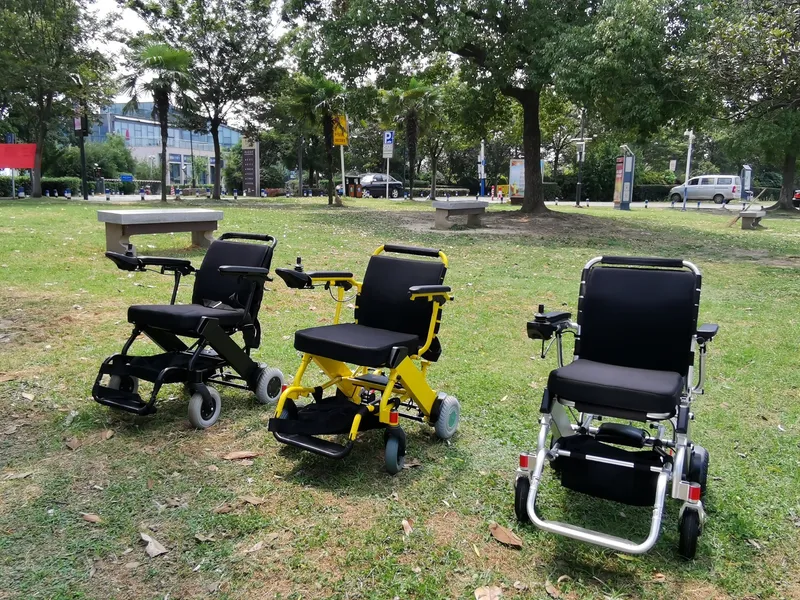 Travel Electric Wheelchair with Footrest Adjustable for Elderly OEM